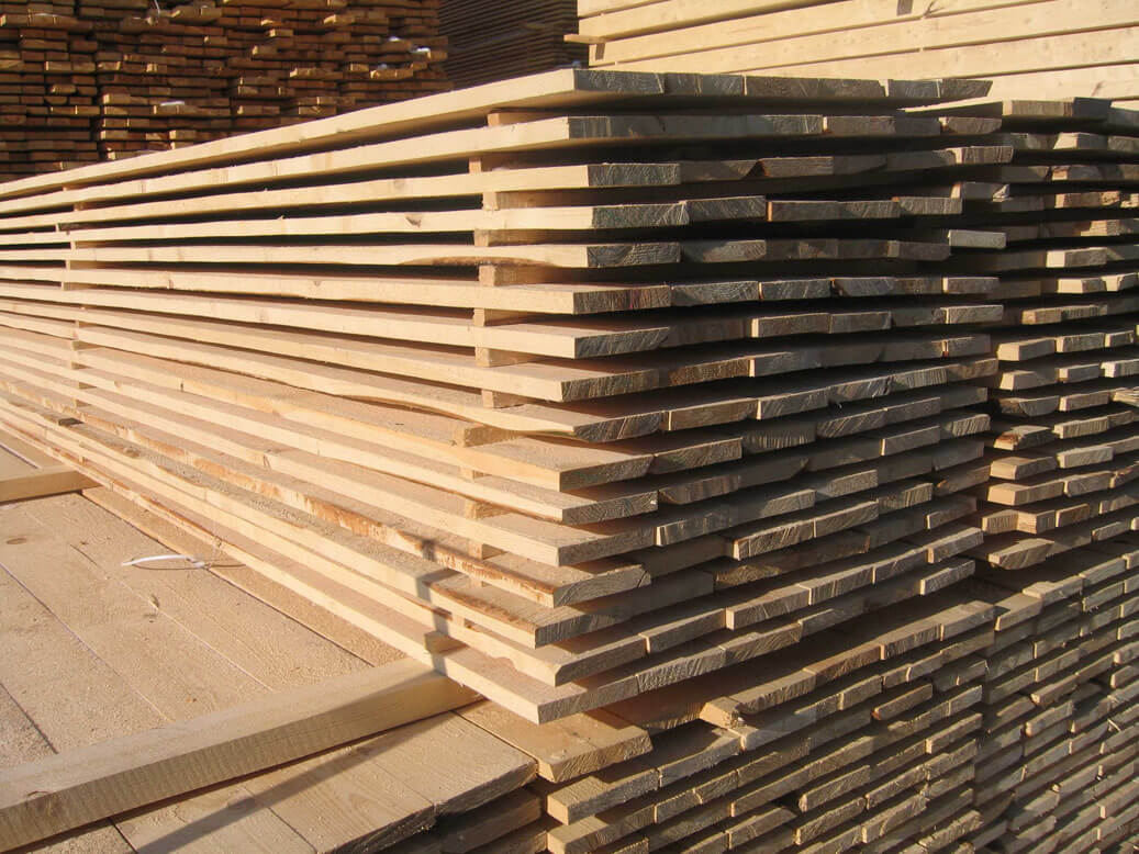 Sawn lumber planks stacked